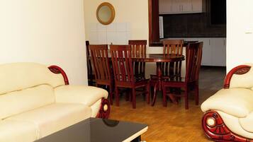 Family Apartment, Balcony, City View | In-room dining