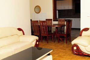 Family Apartment, Balcony, City View | In-room dining