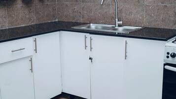 Family Apartment, Balcony, City View | Private kitchen