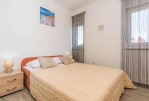 2 chambres, fer et planche à repasser, Wi-Fi, draps fournis