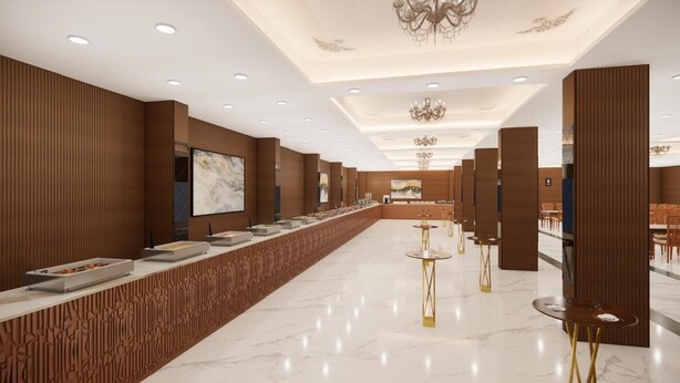 A long reception area with a marble floor, wooden paneling on the walls, and a central counter with food displays. - Sampati Homestay (Rishikesh)