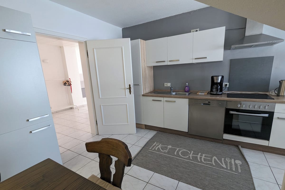 Family Apartment, 2 Bedrooms, Kitchen | Private kitchen | Highchair