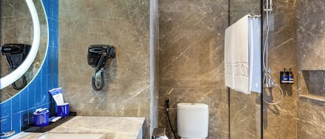 Shower, free toiletries, hair dryer, slippers