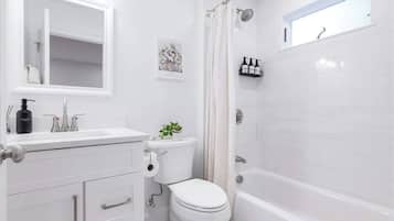 Hair dryer, towels, soap, shampoo
