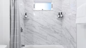 Hair dryer, towels, soap, shampoo