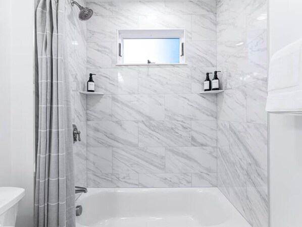Hair dryer, towels, soap, shampoo