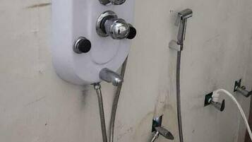 Shower, free toiletries, towels, soap