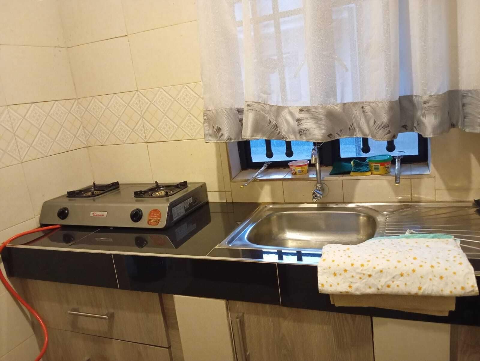 Family Apartment | Private kitchen | Fridge, microwave, cookware/dishes/utensils