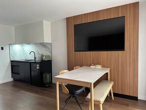 Mini-fridge, microwave, stovetop, cookware/dishes/utensils