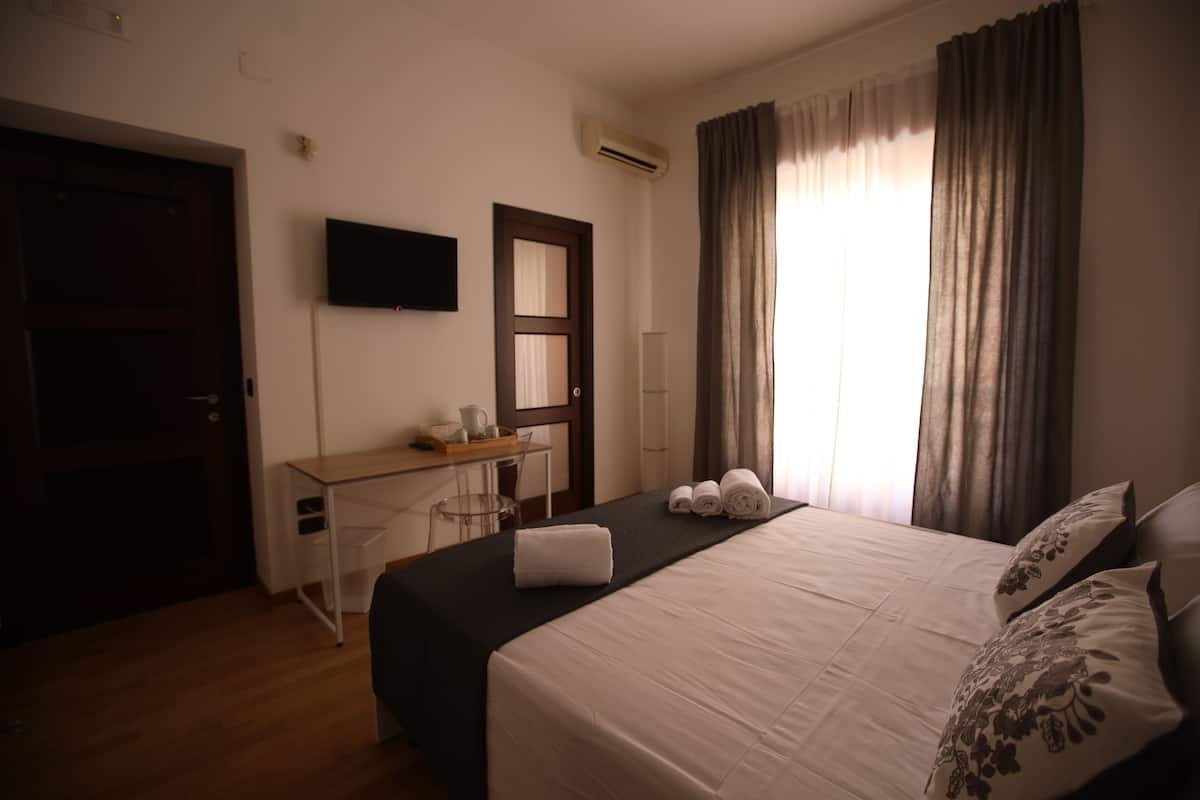 Triple Room, Balcony, City View | Blackout drapes, iron/ironing board, free WiFi