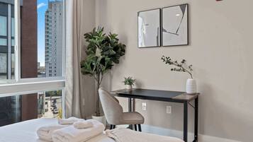1 bedroom, desk, bed sheets