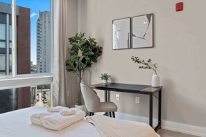 1 bedroom, desk, bed sheets