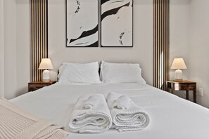 1 bedroom, desk, bed sheets