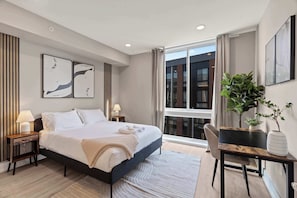 1 bedroom, desk, bed sheets
