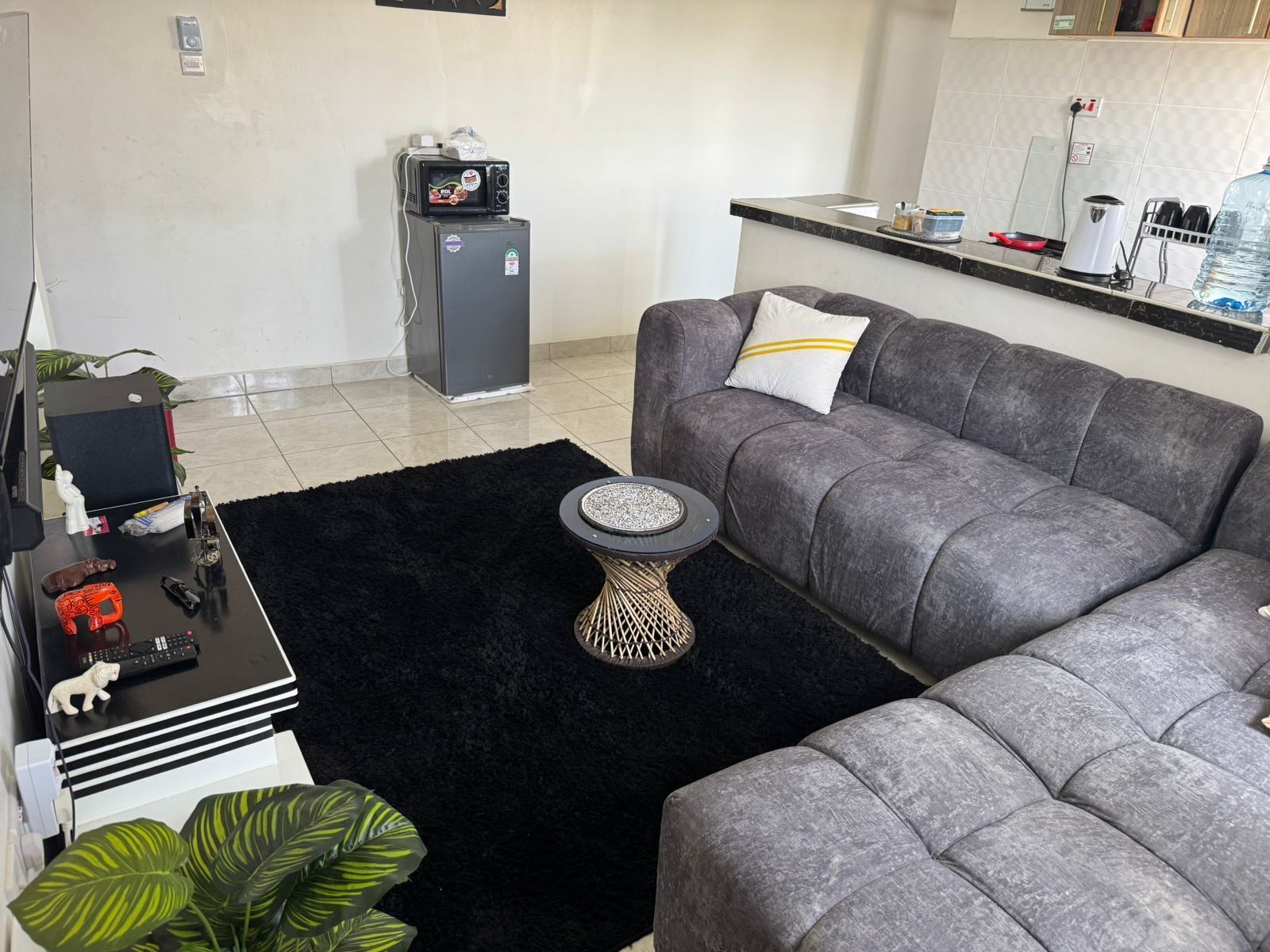 Comfort Apartment | Living area | 32-inch Smart TV with digital channels