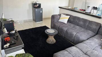 Comfort Apartment | Living area | 32-inch Smart TV with digital channels