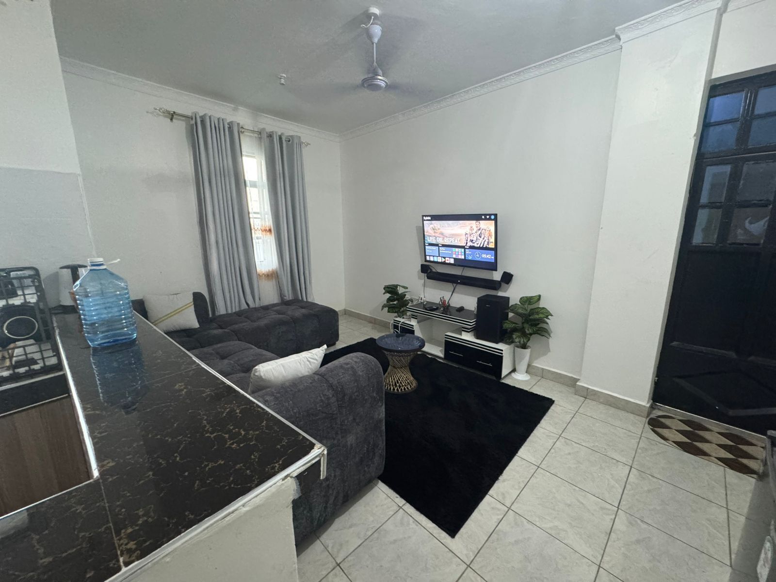 Comfort Apartment | Living area | 32-inch Smart TV with digital channels