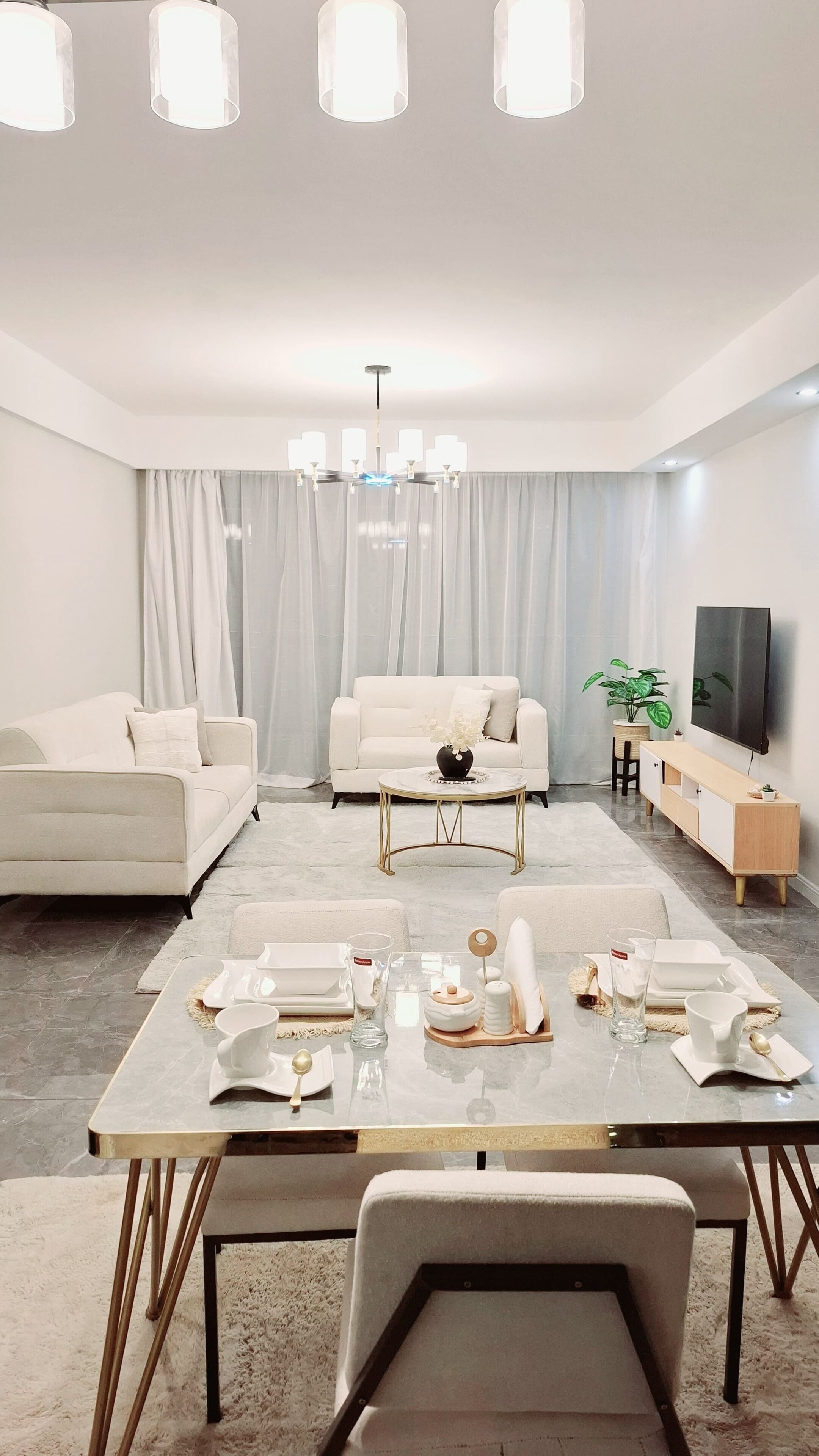 Deluxe Apartment, City View | Living area | 32-inch Smart TV with digital channels