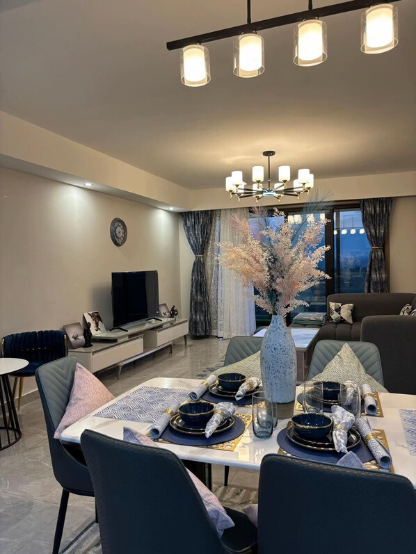 Family Apartment, City View | Living area | 32-inch Smart TV with digital channels - Apple Tree Furnished Apartments Syokimau (Syokimau)