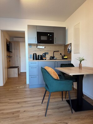 Apartemen, 1 kamar tidur | Makan di kamar