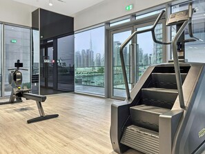 Gym - 3BR with Burj Khalifa and Canal View (Dubai)