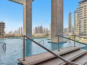 Outdoor pool - 3BR with Burj Khalifa and Canal View (Dubai)