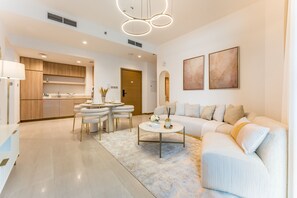 TV - Balcony Facing a Partial Canal View, Close to Metro and Marine Transport (Dubai)