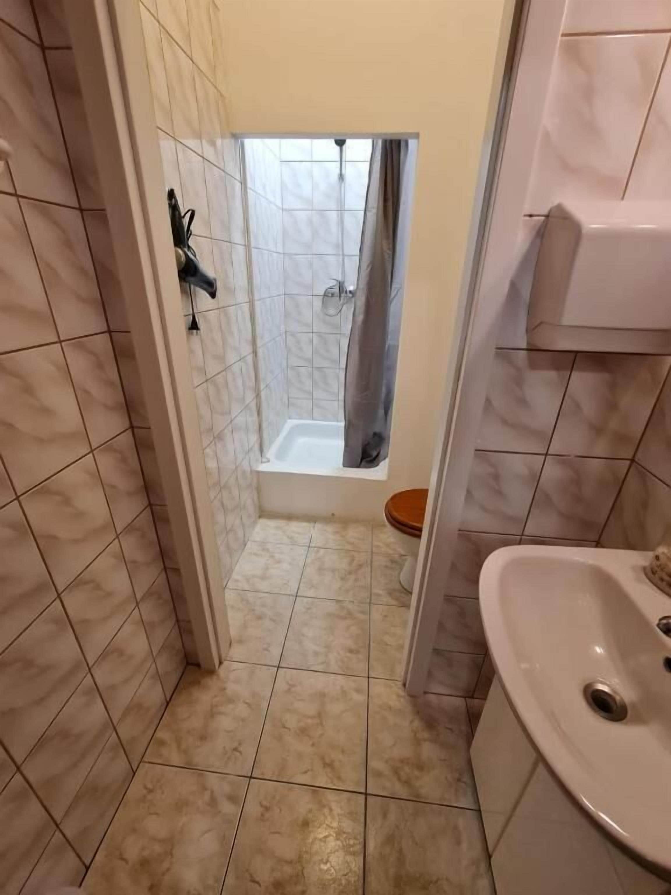 Hair dryer, towels, soap, toilet paper