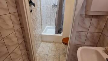 Hair dryer, towels, soap, toilet paper