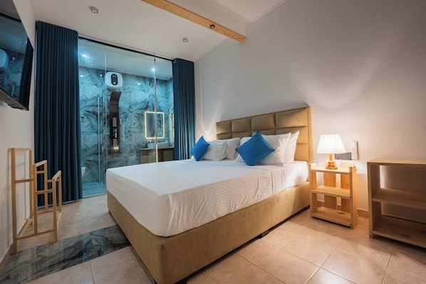 شقة ديلوكس - بشرفة - بمنظر للمسبح | مكواة/لوح كي وواي فاي مجانًا وملاءات أسرّة