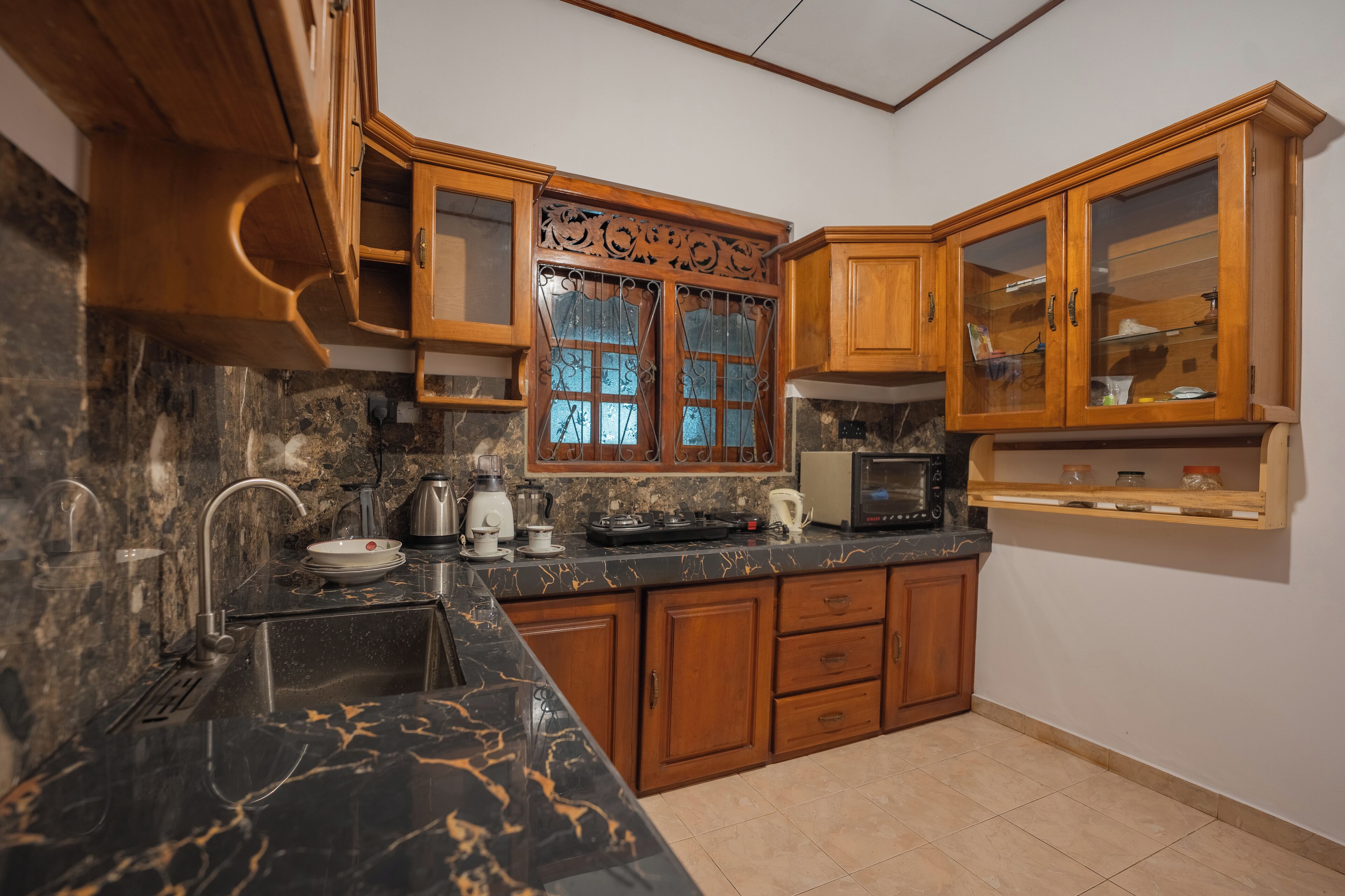 Deluxe Apartment, Balcony, Pool View | Private kitchen | Full-size fridge, microwave, oven, stovetop