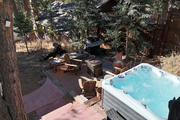 Aerial view of the hot tub and fireplace