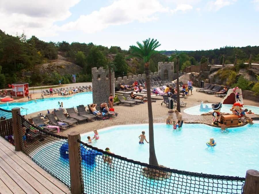 Seasonal outdoor pool, open 10:00 AM to 6:00 PM, pool loungers
