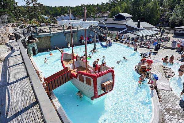 Seasonal outdoor pool, open 10:00 AM to 6:00 PM, sun loungers