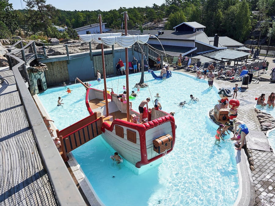 Seasonal outdoor pool, open 10:00 AM to 6:00 PM, pool loungers