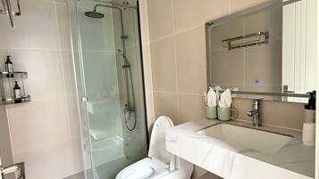 Standard Villa, Balcony, Garden View | Bathroom | Shower, hair dryer, towels, soap