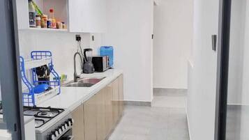 Fridge, microwave, cookware/dishes/utensils