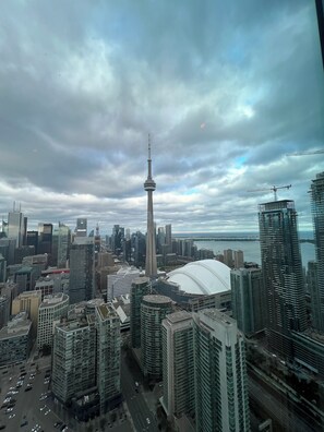 Classic Condo | Living area | 65-inch Smart TV with digital channels, Netflix, streaming services - Upscale Cityscape Toronto (Toronto)