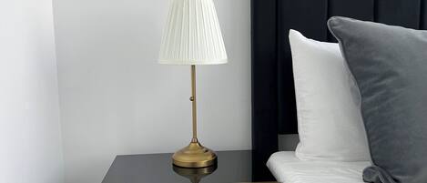 Premium bedding, Tempur-Pedic beds, laptop workspace, soundproofing