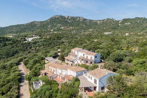 A hillside village with traditional white buildings and terracotta roofs. - Casa Pierina by Wonderful Italy (Olbia)