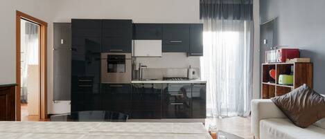 1 室のベッドルーム、アイロン / アイロン台