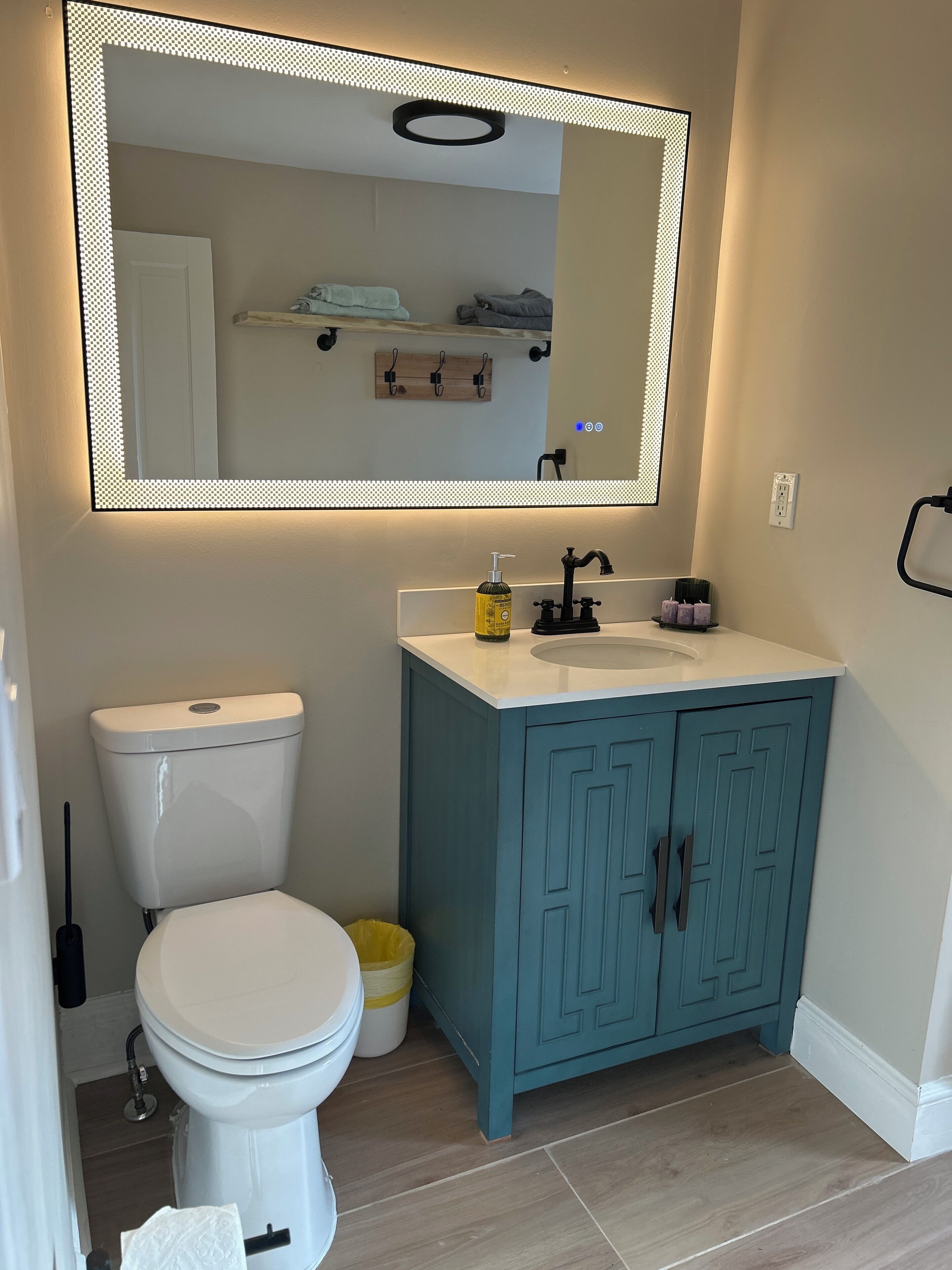 Hair dryer, towels, soap, toilet paper