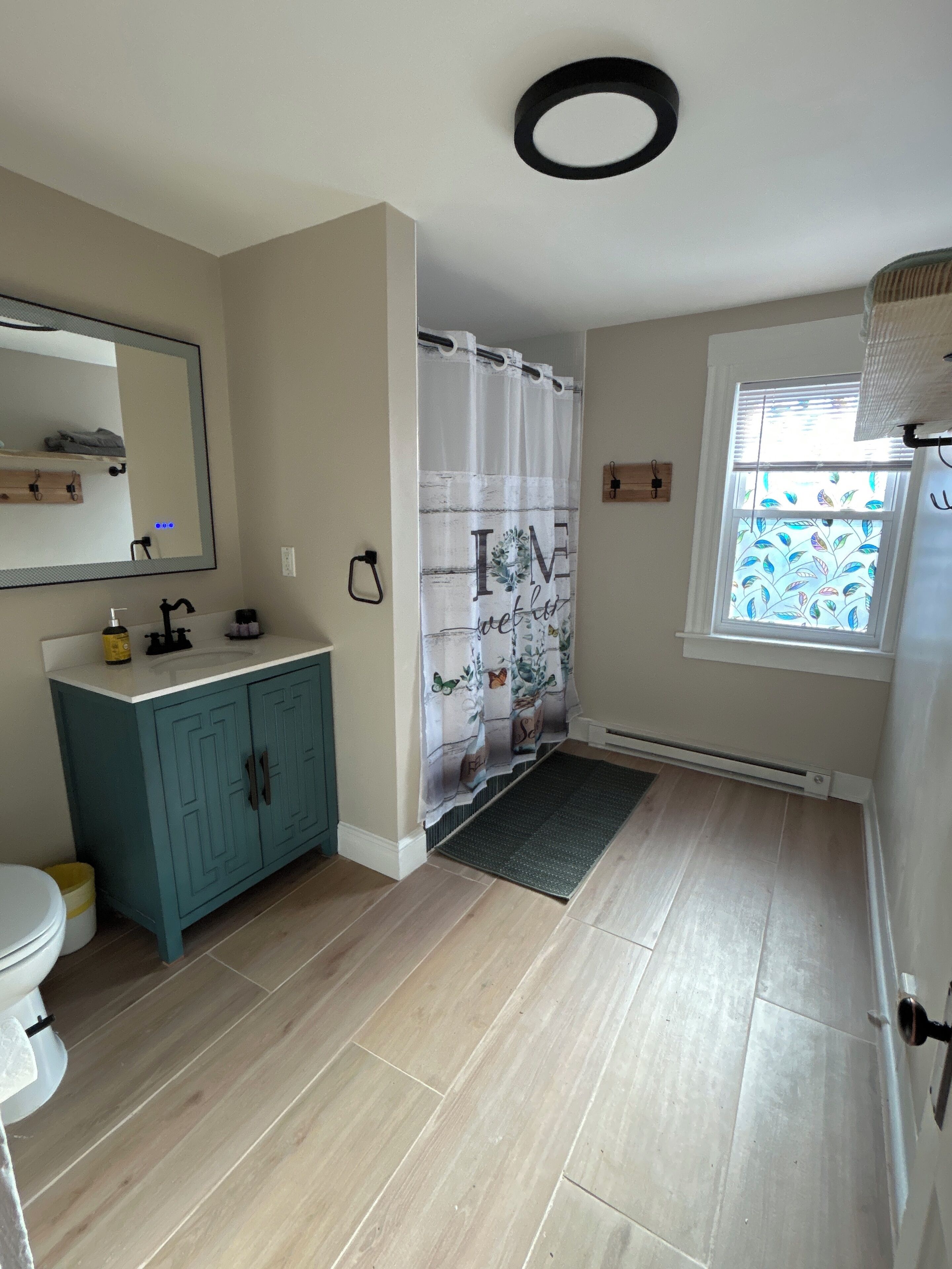 Hair dryer, towels, soap, toilet paper