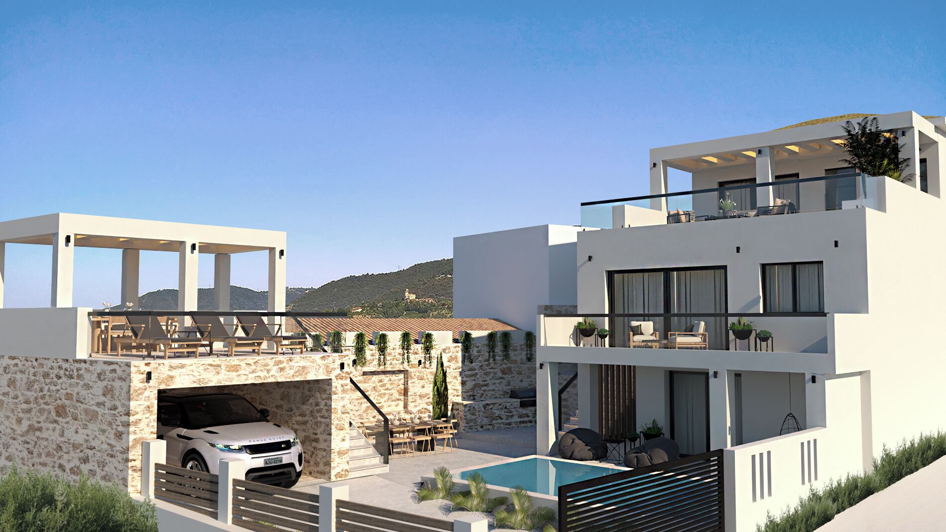 A modern two-story house with a stone facade, a swimming pool, and a covered outdoor seating area.