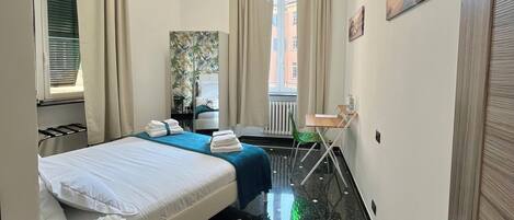 Suite, kjøkken, byutsikt | Italienske Frette-laken, sengetøy av topp kvalitet og dundyner