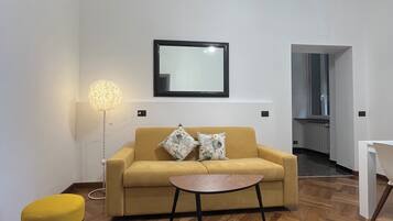 Suite, cocina, vistas a la ciudad | Zona de estar