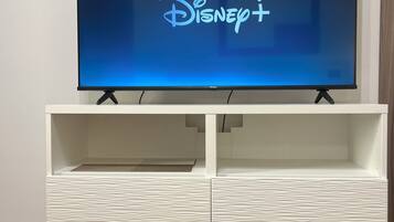 Suite, cocina, vistas a la ciudad | Zona de estar