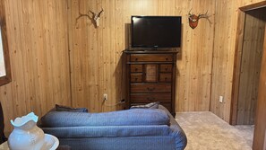 Living area - Rustic Log Home Basement with Trail Access – Ideal Snowmobiler’s Winter Retreat (Gwinn)