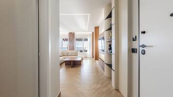 Luxury Penthouse, Beach View | Living area | 55-inch LED TV with cable channels