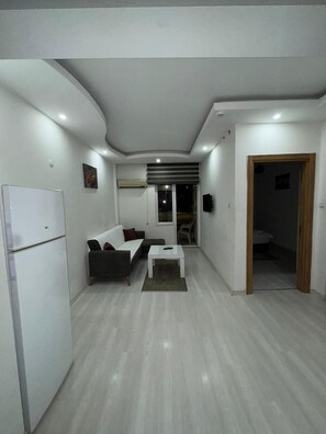 Economy Studio, Balcony, City View | Living area